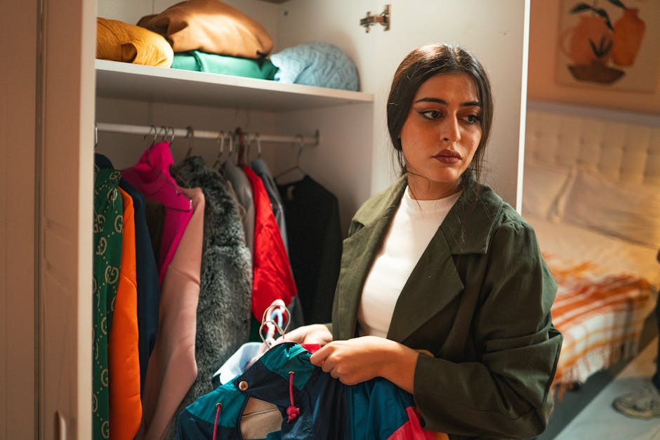 Woman organizing her beautifully designed wardrobe